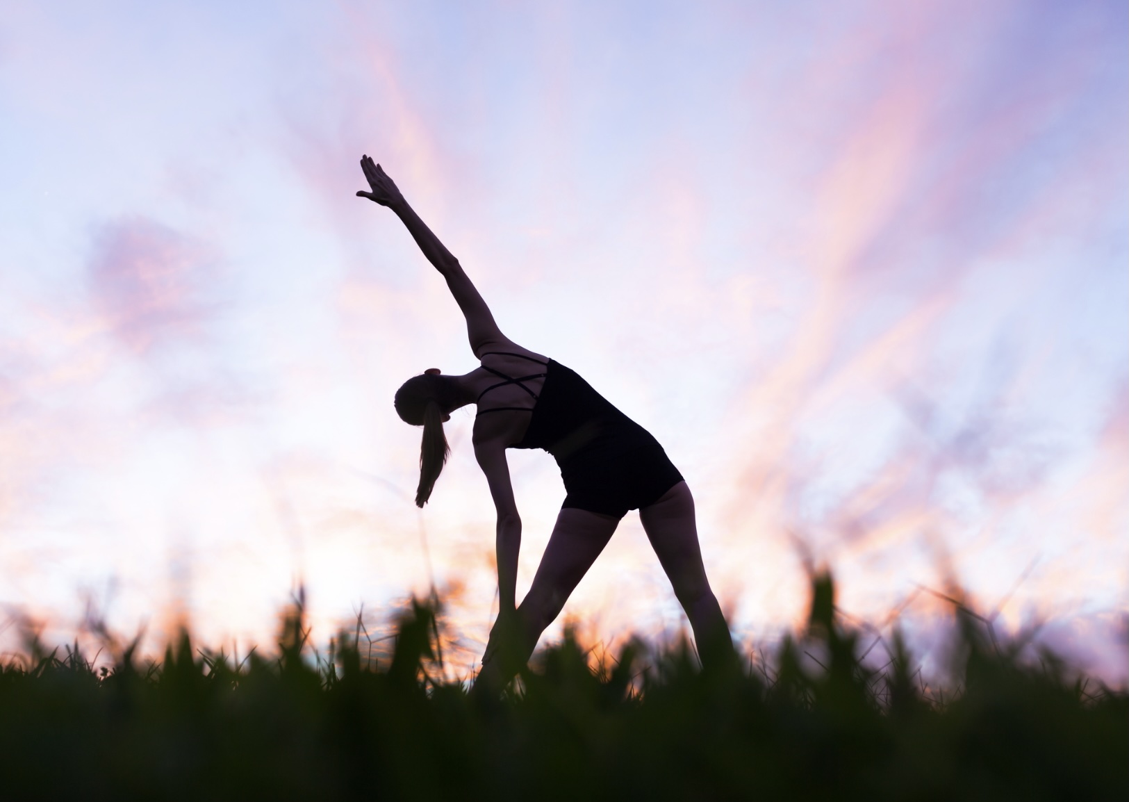 An active, healthy woman confidently participating in everyday functional activity.